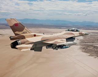 A moroccan air force f-16 jet in flight