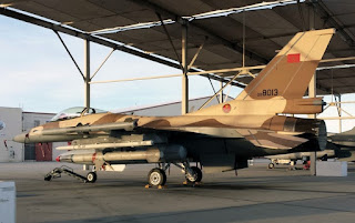 A moroccan air force f-16 jet in a hanger